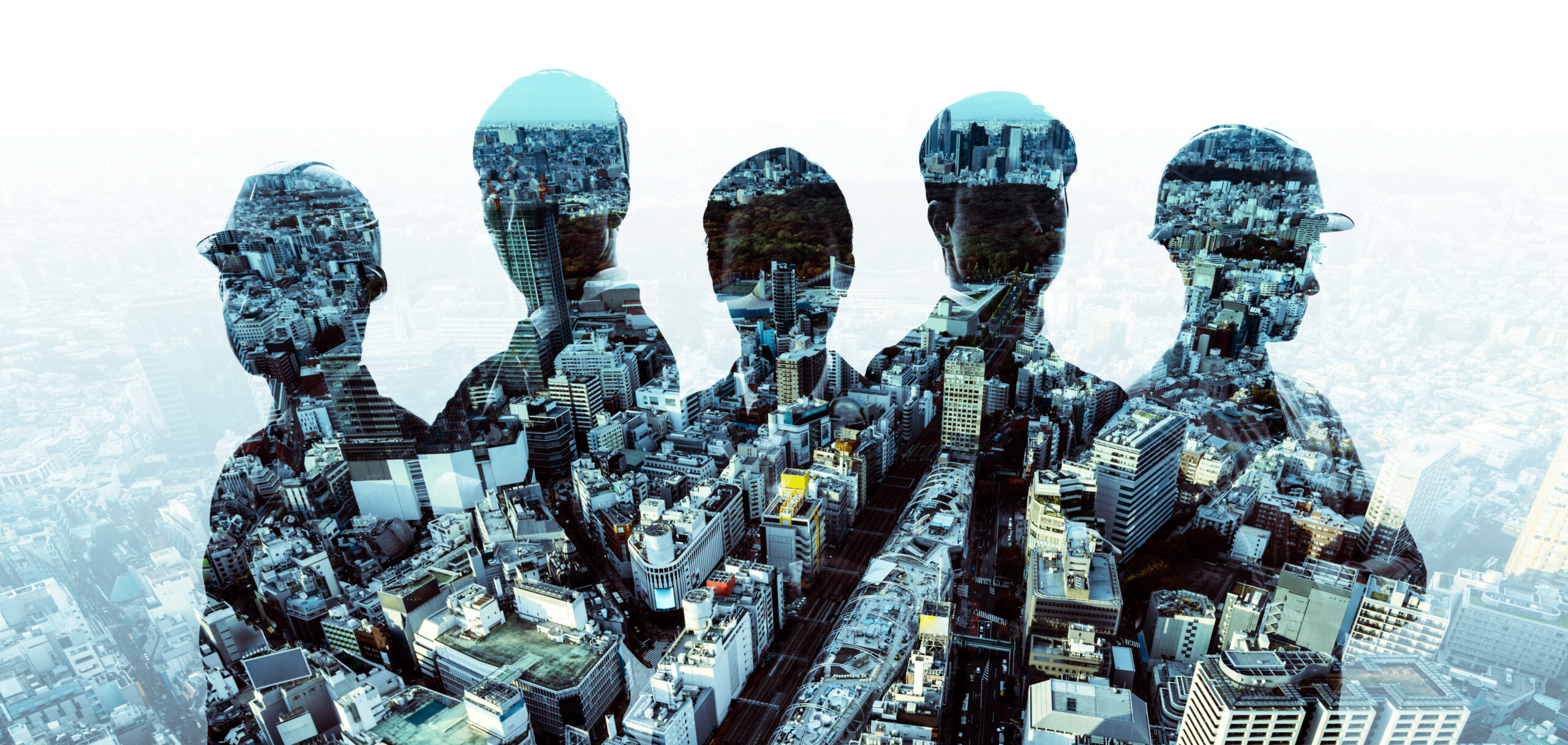 複数の人物のシルエットに都市の風景が重ね合わされている